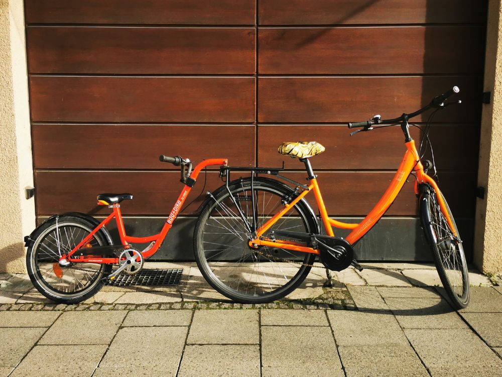 a bicycle parked on the side of a building