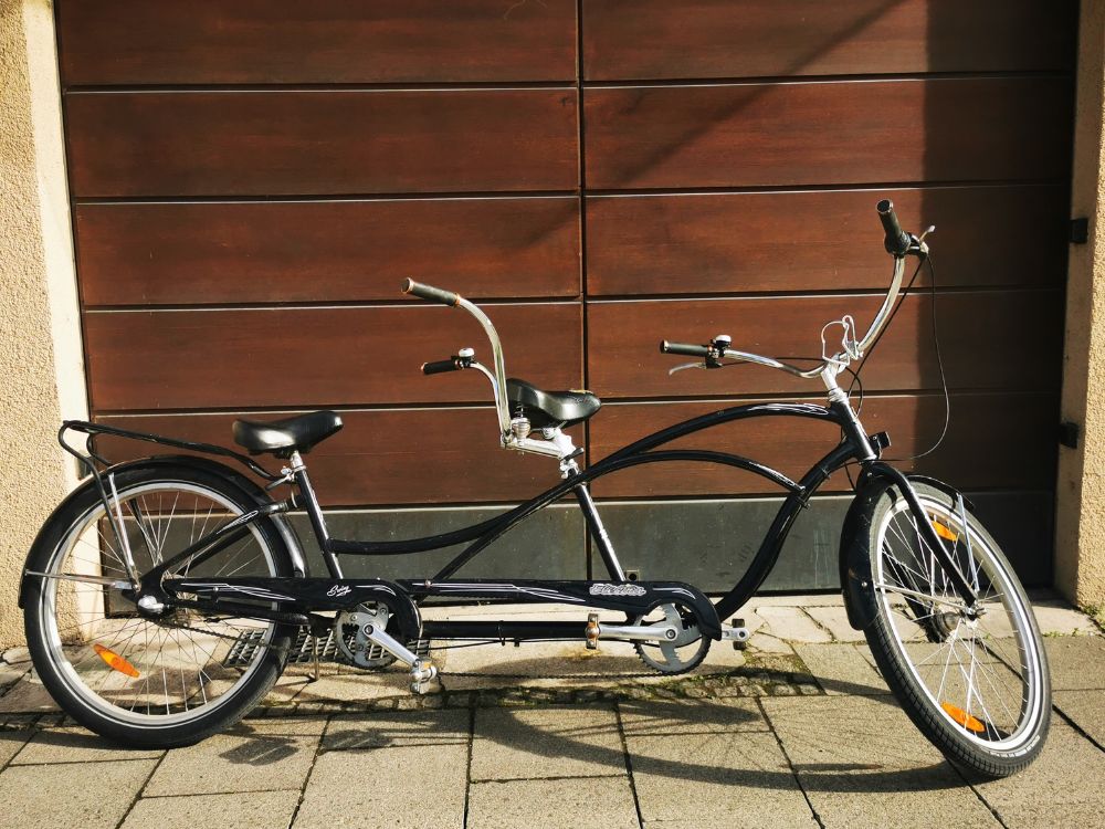 a bicycle parked on the side of a building