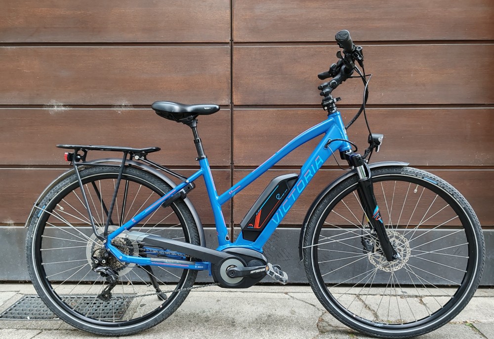 a bicycle parked in front of a building