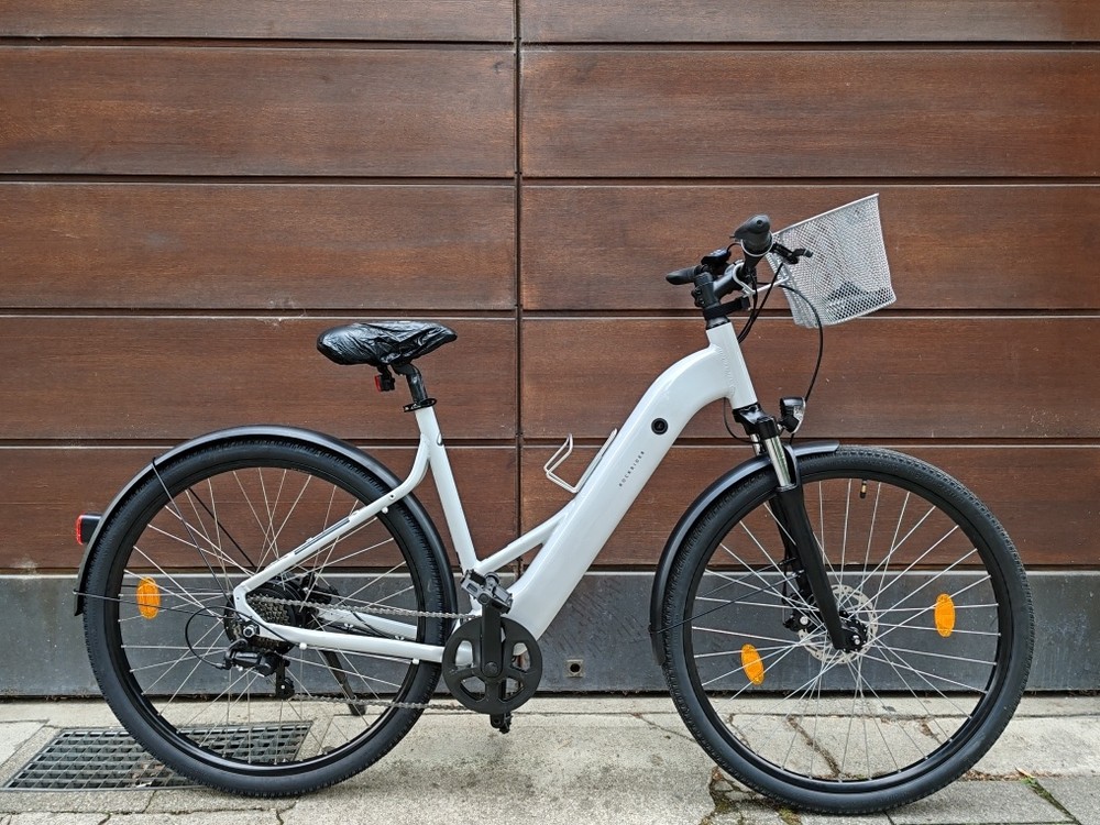 a bicycle parked on the side of a building