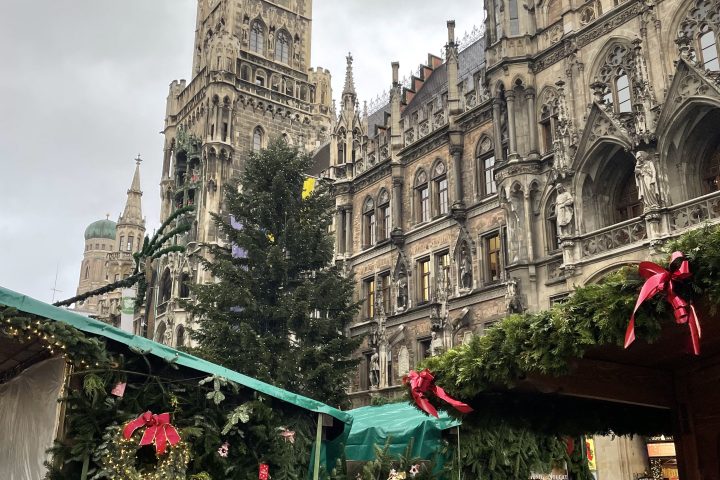 a clock tower in front of a building