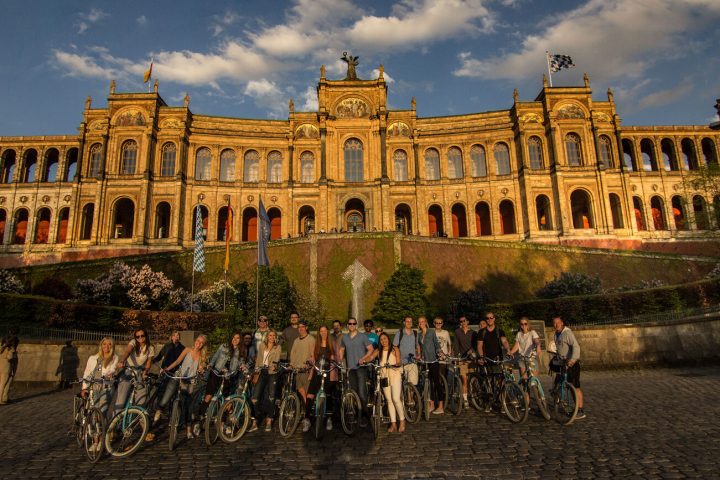 a group of people in front of a building