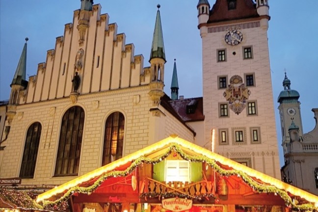 a group of people standing in front of a building