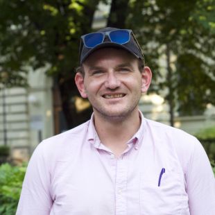 6 a person standing posing for the camera