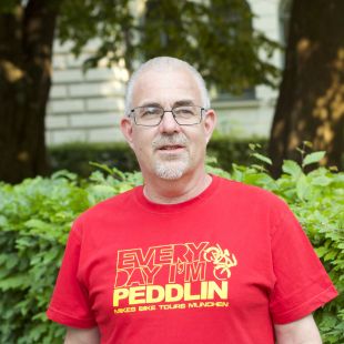 9 a man wearing a green shirt