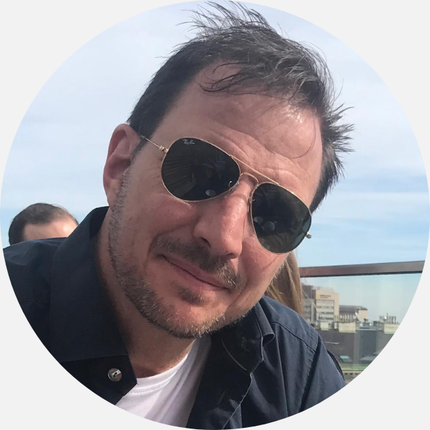 Mike Lasher 2024 circle format a man wearing sunglasses